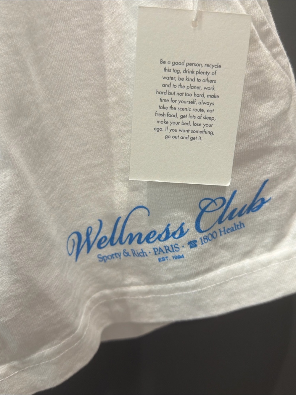 Sporty & Rich Wellness Club White Tee with Light Blue Script